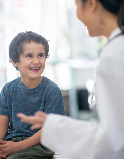 A doctor from Life Span was talking to the young boy, making sure he felt comfortable during his visit.