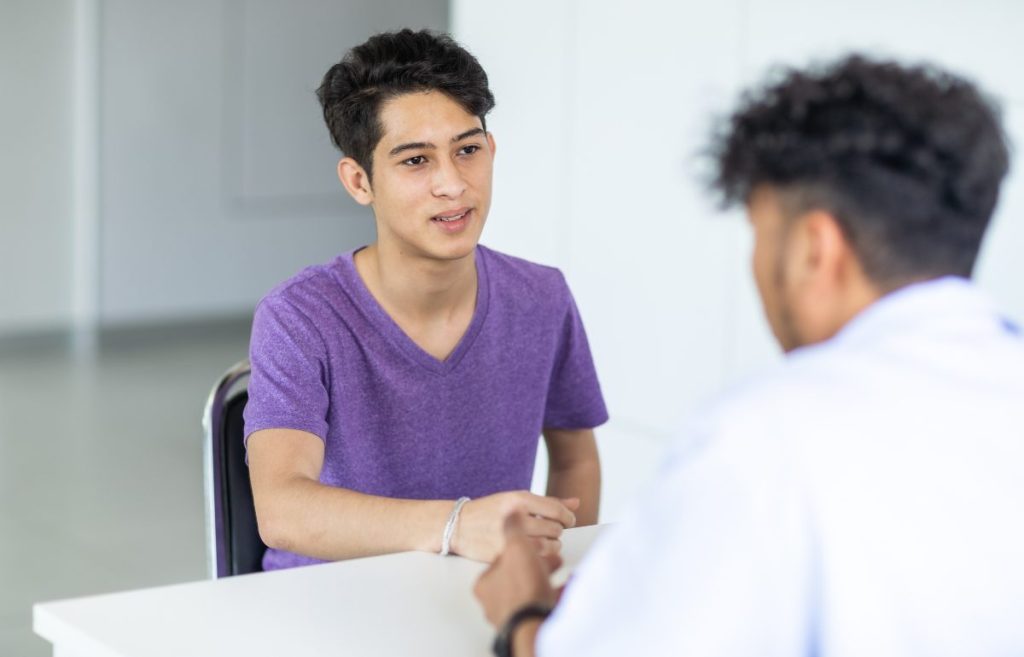 A doctor from Life Span was discussing the patient's health concerns during the consultation.