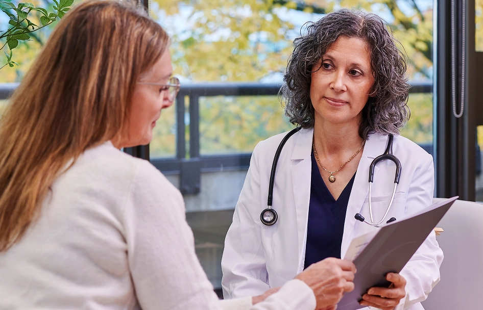"A doctor from Life Span is discussing treatment options with a patient during their consultation."